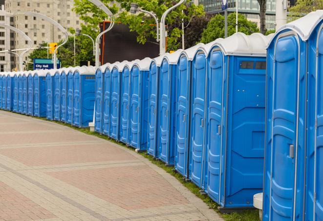 a line of portable restrooms at an outdoor wedding, catering to guests with style and comfort in Azusa, CA